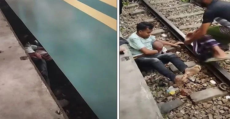 চলন্ত ট্রেনের নিচ থেকে সন্তানকে বাঁচালেন বাবা