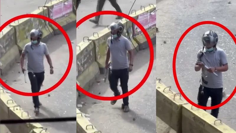 চট্টগ্রামে সংঘর্ষ চলাকালে পিস্তল হাতে কে এই যুবক